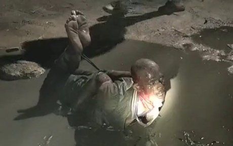 Caught Thief: Tied Up, Face-Down in Mud, Pounded by Machete Blade
