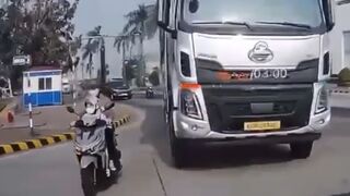 Mother Crushed to Death by Truck While Riding Scooter with Son; Child Survives