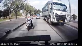 Mother Crushed to Death by Truck While Riding Scooter with Son; Child Survives