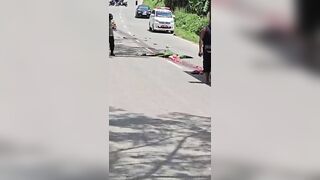 Woman on Scooter Pulverized by Truck – Body Left in Pieces on the Asphalt