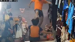 Man Brutally Attacks Clothing Seller in Front of Her Two Young Children