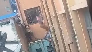 Illegal foreigner jumps off the building  running away from deportation