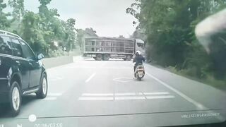 Slow Thinking Rider Crashes Into The truck Head First