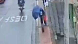 Woman Waiting for the Bus Gets Fatally Struck by Loose Tyre