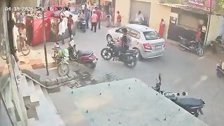 Speeding Thar Hits Young Woman on Scooty, SUV Flips Leaving Victim Seriously Hurt