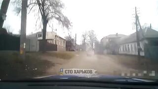 A Ukrainian is trying to get away from persistent policemen in Kharkov