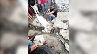 Two Killed Instantly When Massive Concrete Wall Collapses Onto Sidewalk