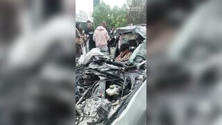 One Dead After BMW Crashed Ino A Parked Truck In China