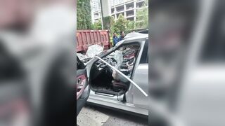 One Dead After BMW Crashed Ino A Parked Truck In China
