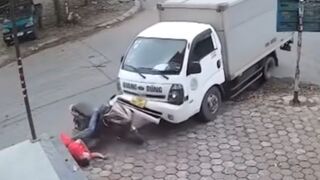 Motorcyclist Pulled Under Truck and Crushed Against the Curb in Brutal Accident