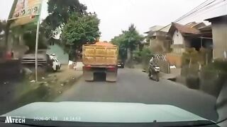 Motorcyclist Dies After Losing Control While Overtaking & Being Crushed by Sand Truck