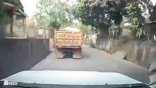 Motorcyclist Dies After Losing Control While Overtaking & Being Crushed by Sand Truck