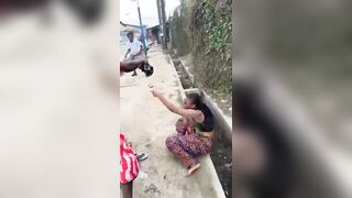 Woman Attacked by Masquerade During Cultural Festival