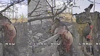A torn Russian soldier hangs on a fence