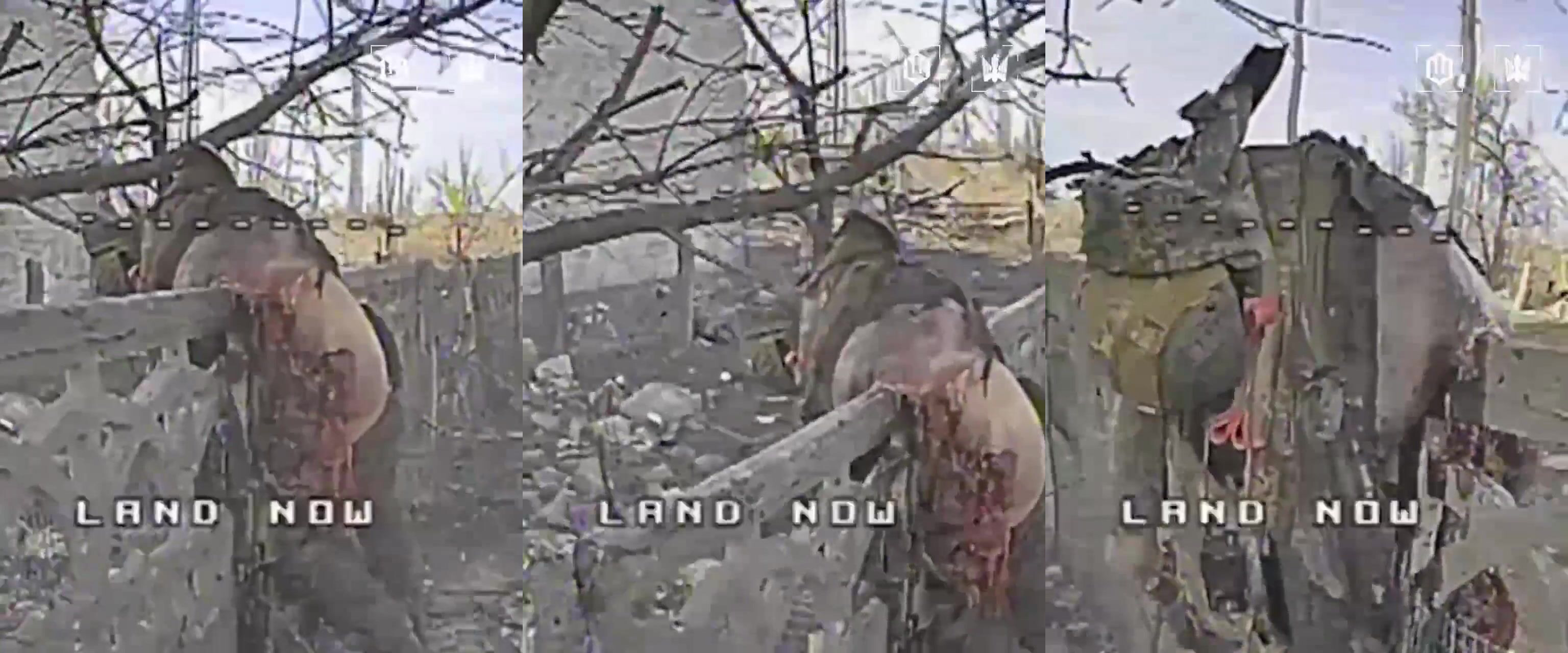 A torn Russian soldier hangs on a fence