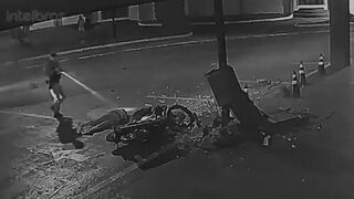 Motorcycle Couple Flees Police Checkpoint, Crashes into Concrete Pillar