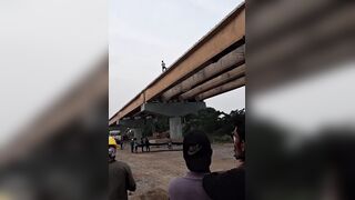 Worker Leaps From Bridge Under Construction In Protest Over Unpaid Wages