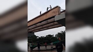 Worker Leaps From Bridge Under Construction In Protest Over Unpaid Wages