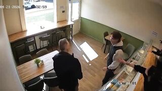 UK: Man walks into a shop and stabs the person sat down
