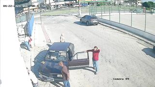 Man Gets Pinned Against The Wall By Female Driver