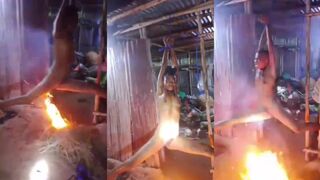 Horrifying Video Shows Naked Woman Tied Over Fire in Benin Sparks An Outrage