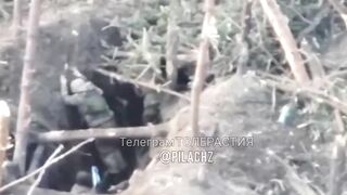 A Russian military man alone quietly sneaks up to the trench of the Ukrainian Armed