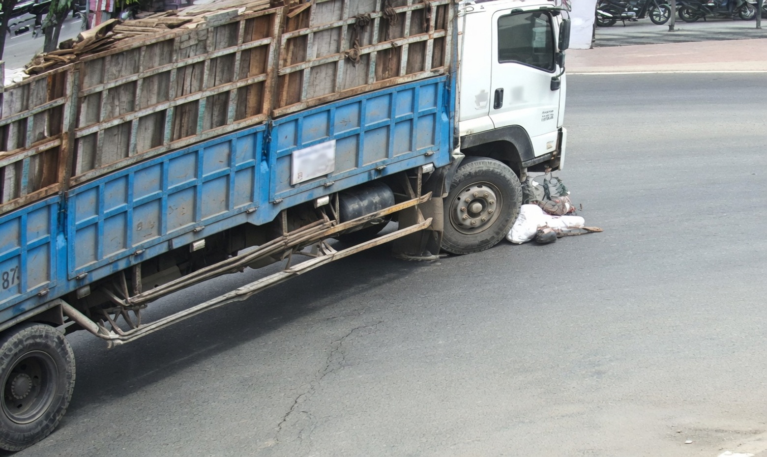 Elderly Man Doesn't Stand a Chance: Truck Crushes Scooter at Intersection