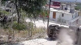 Truck flips trying to drive up a steep road
