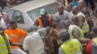 Phone Snatcher Attacked By Mob As Cop Tries To Shield Him