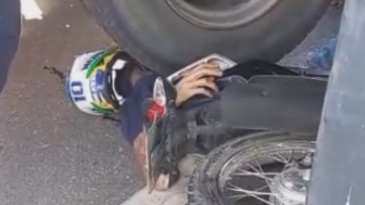 Biker1s Life Ended Under The Truck Wheels