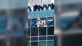 Half-naked man on the sign of Kazan Aviation University