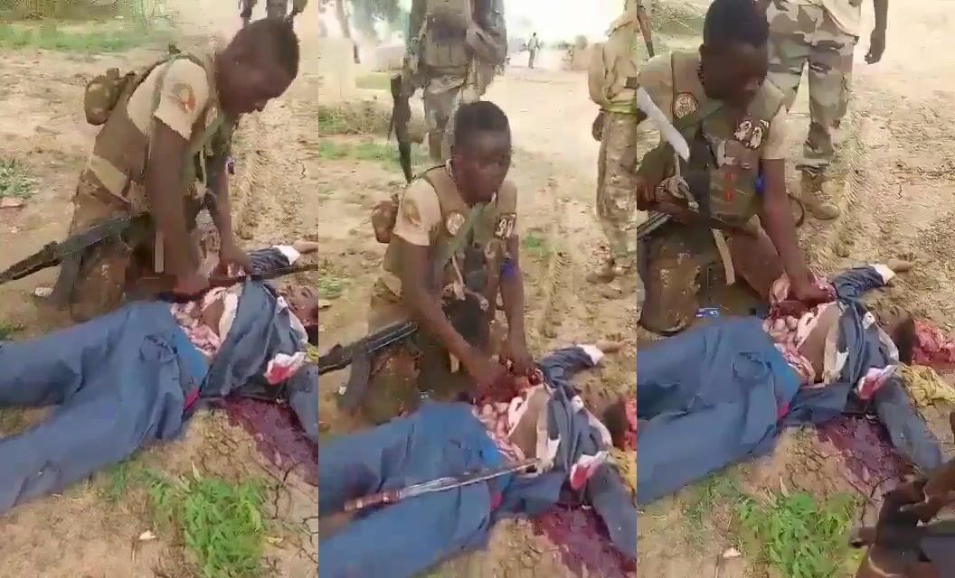 Soldier Butchers A Dead Enemy In Mali