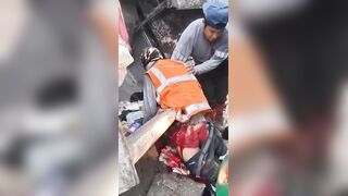Sanitation Worker Dies After Being Cut in Half by Bus Hitting Garbage Truck