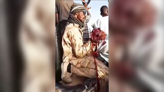 Sudanese Soldier Plays With Guts Of RSF Fighter (Extended)