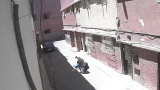 Horrific Hatchet Attack Caught on Video – Man Struck from Behind in Morocco Alley