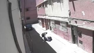 Horrific Hatchet Attack Caught on Video – Man Struck from Behind in Morocco Alley