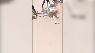Thief Brutally Mutilated with Machete & Burned to Death by Angry Mob