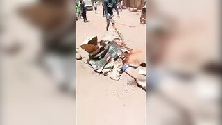 Thief Brutally Mutilated with Machete & Burned to Death by Angry Mob