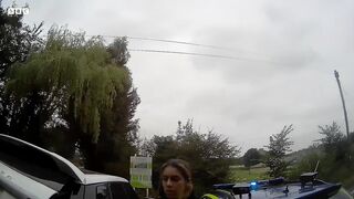 Video that police denied existed shows woman pinned down