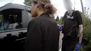 Video that police denied existed shows woman pinned down