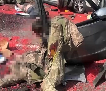 Streams of blood and human organs on the asphalt! (more videos)