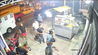Gunmen Jump Out of Pickup Truck & Open Fire Outside Fast Food Restaurant, Killing Two