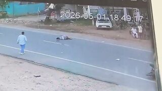 Bike Rider Violently Thrown by Speeding Car – CCTV Video Goes Viral