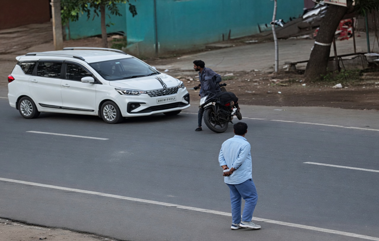 Bike Rider Violently Thrown by Speeding Car – CCTV Video Goes Viral