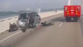 Two Motorbikers Crash Into A Parked On Bridge Vehicle