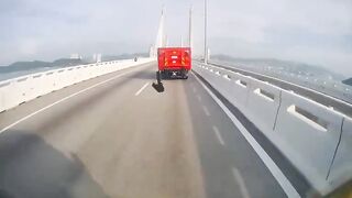 Two Motorbikers Crash Into A Parked On Bridge Vehicle