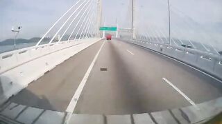 Two Motorbikers Crash Into A Parked On Bridge Vehicle