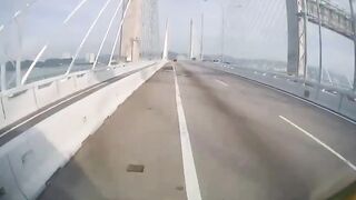 Two Motorbikers Crash Into A Parked On Bridge Vehicle