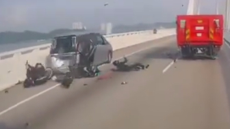 Two Motorbikers Crash Into A Parked On Bridge Vehicle