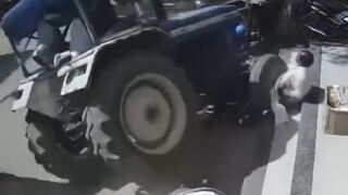 CCTV Horror: Out-of-Control Tractor Massacres Scooter in Broad Daylight